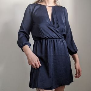Navy faux wrap dress with open back